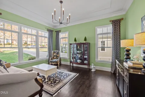 a workspace with furniture and a window