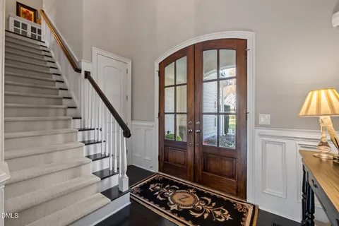 a bathroom with a sink vanity granite and shower
