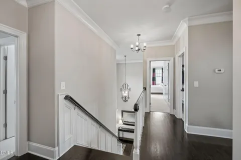 a spacious bedroom with a bed and a window