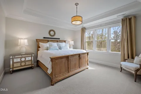 a bathroom with a sink vanity granite and shower