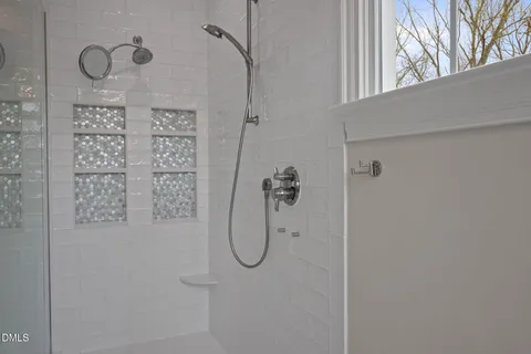 a view of a patio with table and chairs and potted plants