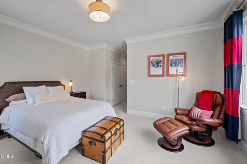 a view of a patio with table and chairs and potted plants