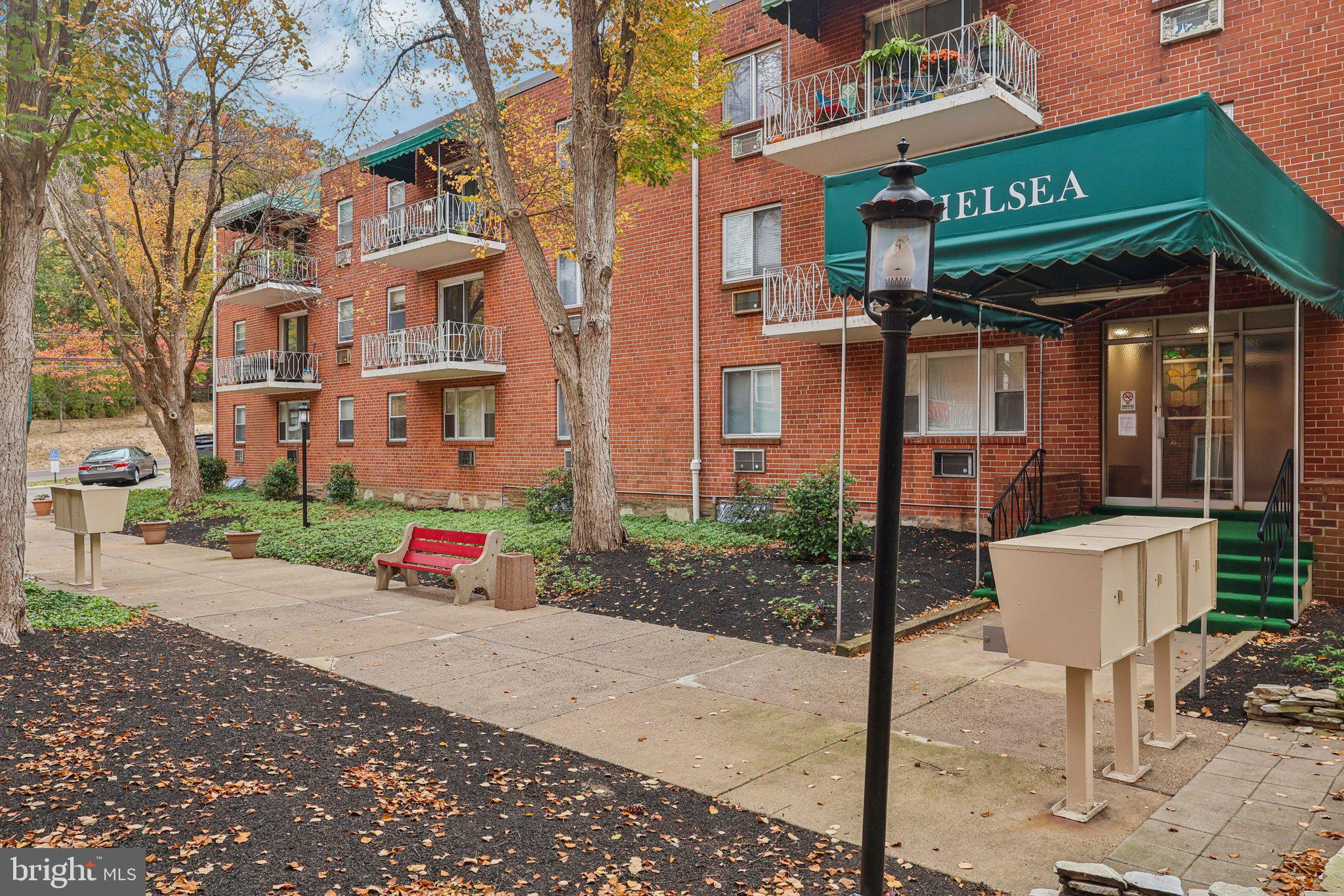 a view of a brick building with many windows
