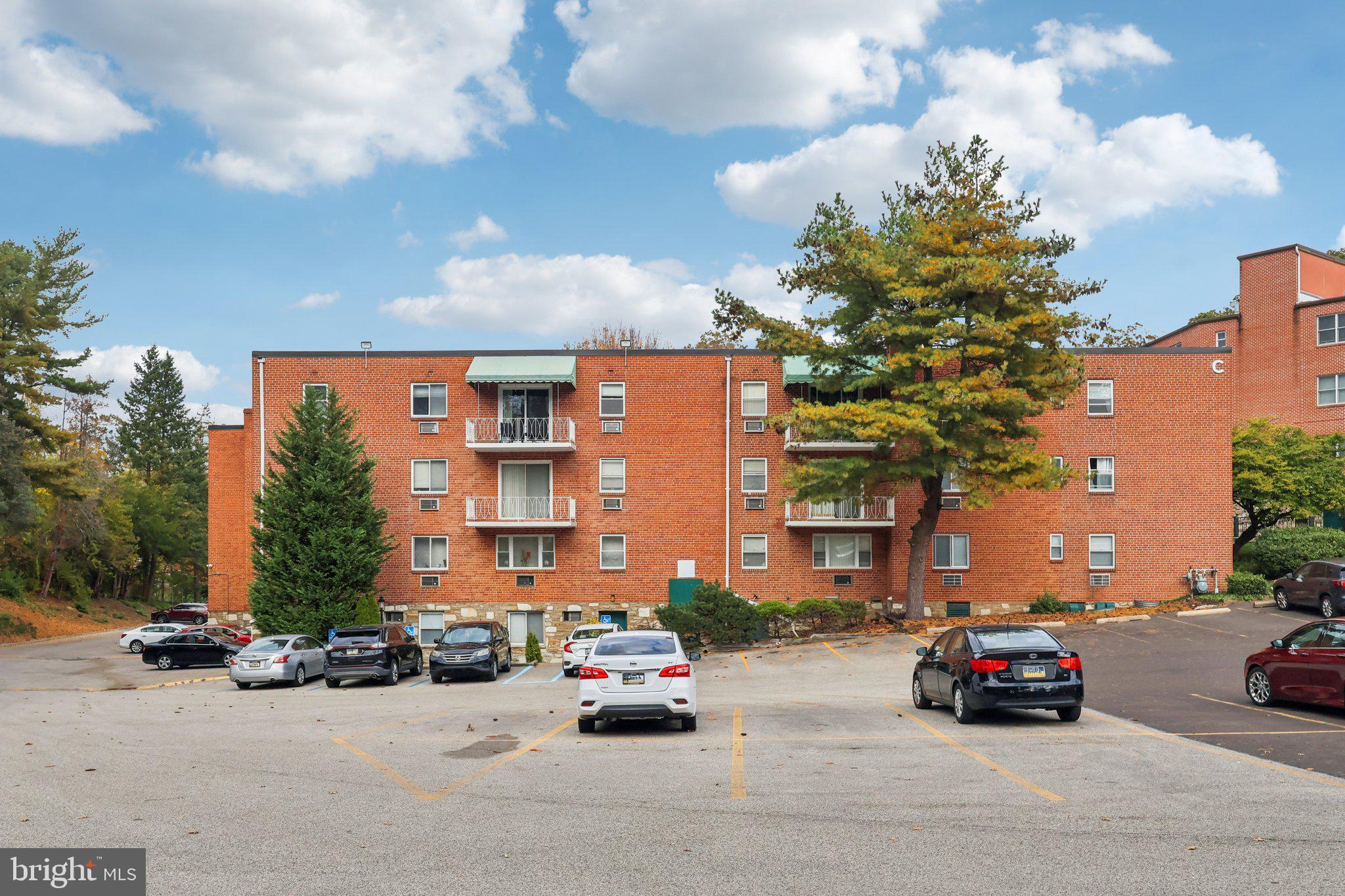 1600 Church Road, Unit C111 Wyncote, PA 19095 - Photo 22 of 24 a car parked in front of a building
