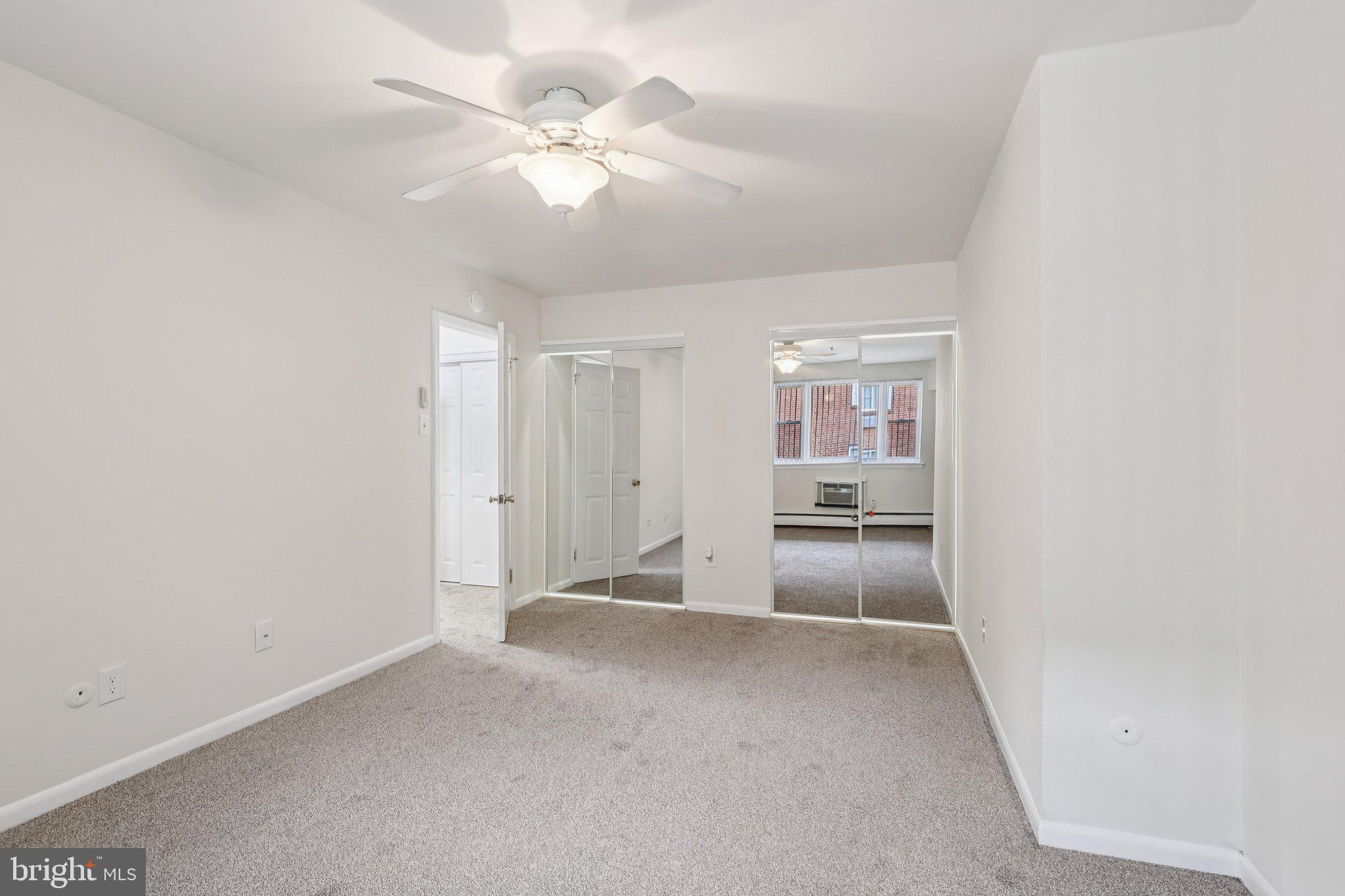 1600 Church Road, Unit C111 Wyncote, PA 19095 - Photo 10 of 24 an empty room with windows and fan