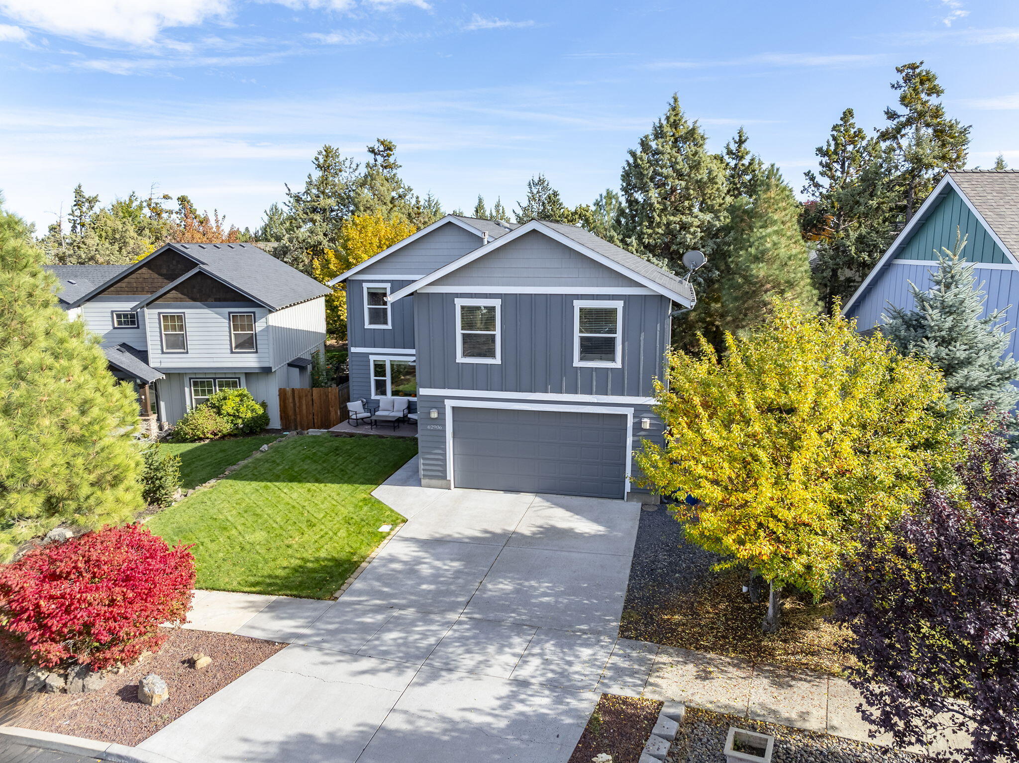 62906 Bilyeu Way Bend, OR 97701 - Photo 38 of 100 a front view of a house with a yard and garage