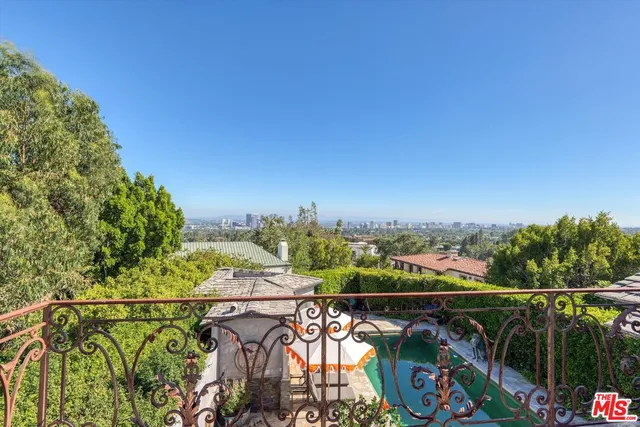 a view of a balcony with city view