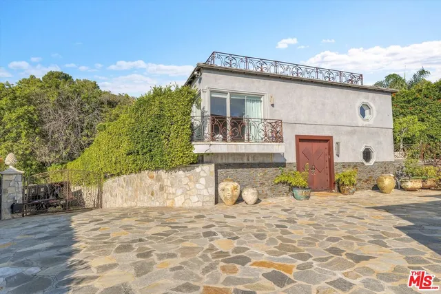 a view of a house with a patio