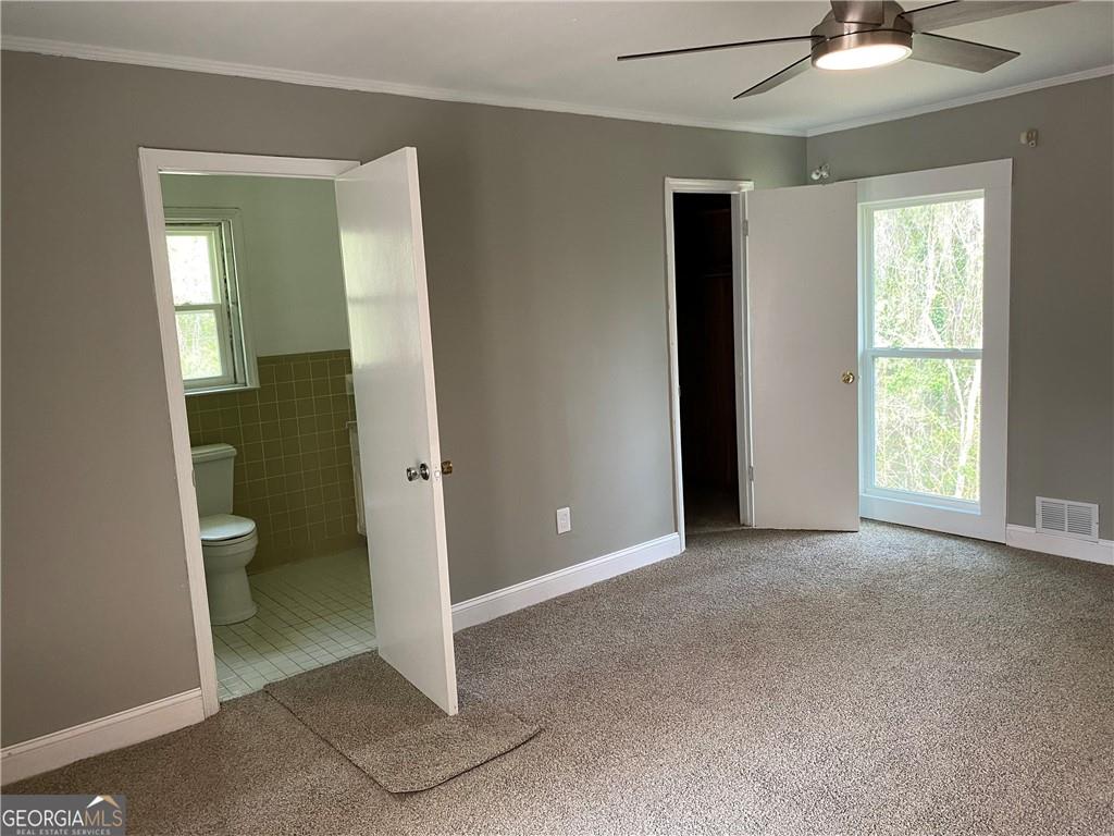 4029 Winding Way Macon, GA 31204 - Photo 12 of 24 a view of a bathroom with a sink and a toilet