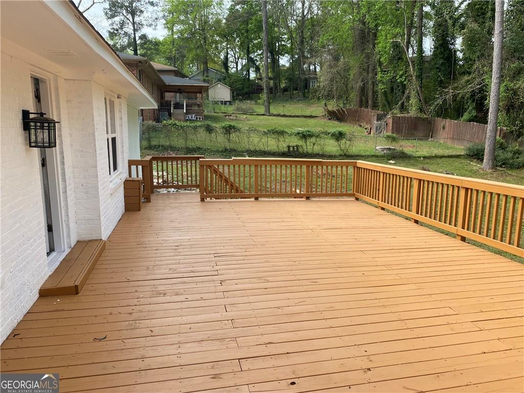 4029 Winding Way Macon, GA 31204 - Photo 20 of 24 a view of balcony with wooden floor and outdoor space