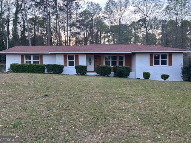 4029 Winding Way Macon, GA 31204 - Photo 24 of 24 a front view of a house with a yard