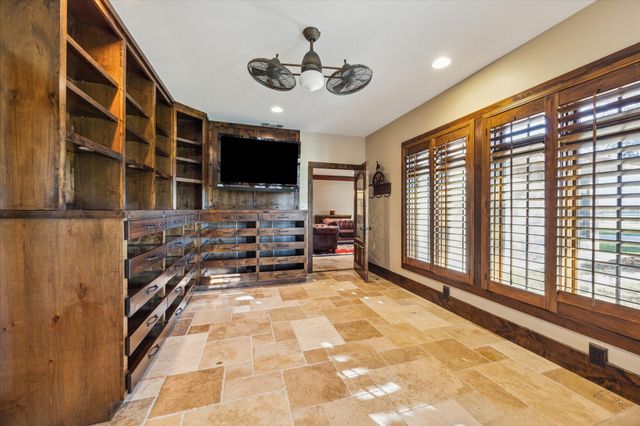 a view of livingroom with furniture and windows
