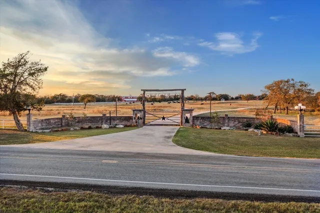 a view of a yard and ocean view
