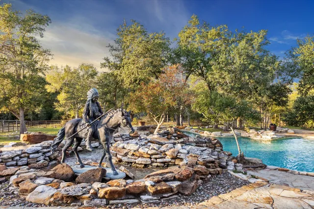 a view of a lake with a city