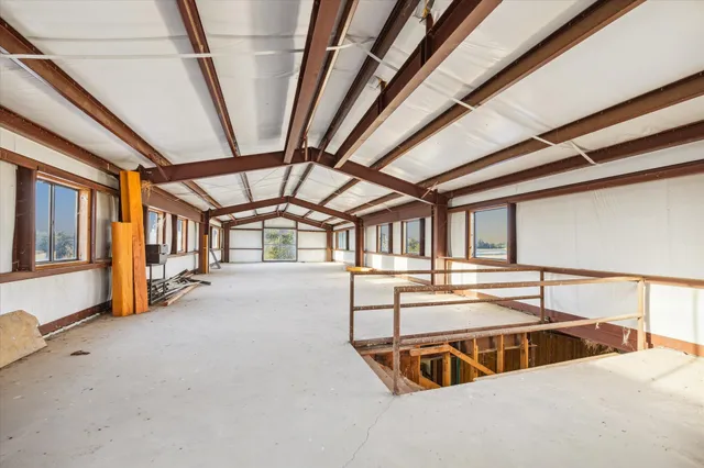 an aerial view of residential building and ocean