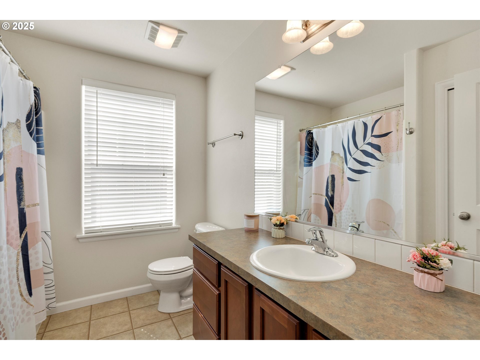 1153 Chinookan Drive Cascade Locks, OR 97014 - Photo 11 of 27 a bathroom with a sink a toilet and a mirror