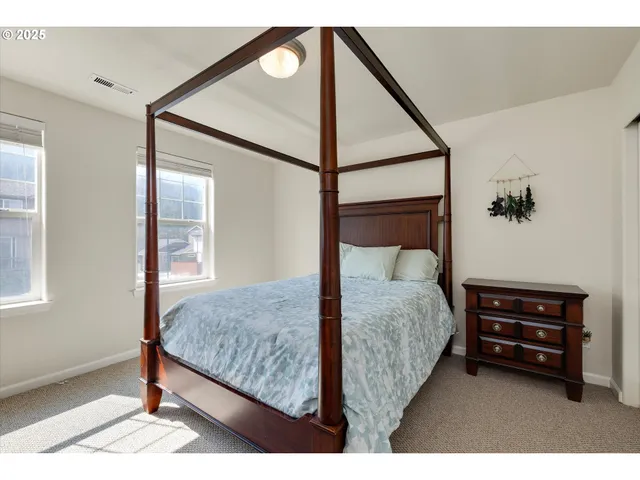 a bedroom with a bed and closet