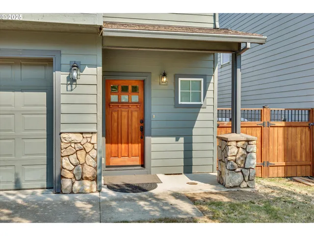 a view of a wooden door of the house