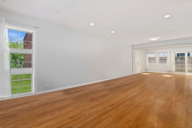 772 Green Bay Road Winnetka, IL 60093 - Photo 3 of 31 a view of empty room with wooden floor and fan