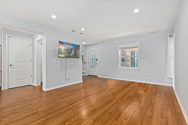 772 Green Bay Road Winnetka, IL 60093 - Photo 8 of 31 a view of livingroom with hardwood floor and hallway