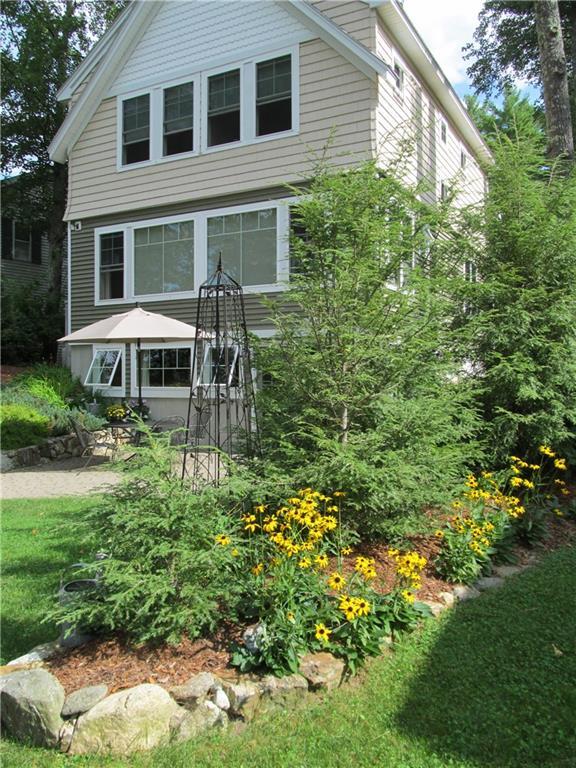 64 Indian Village Road Shapleigh, ME 04076 - Photo 11 of 35 Landscaped berm w/ Patio in background