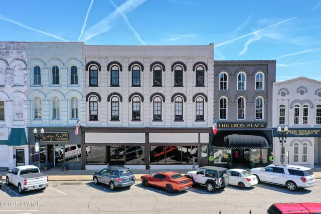 a car parked in front of a building