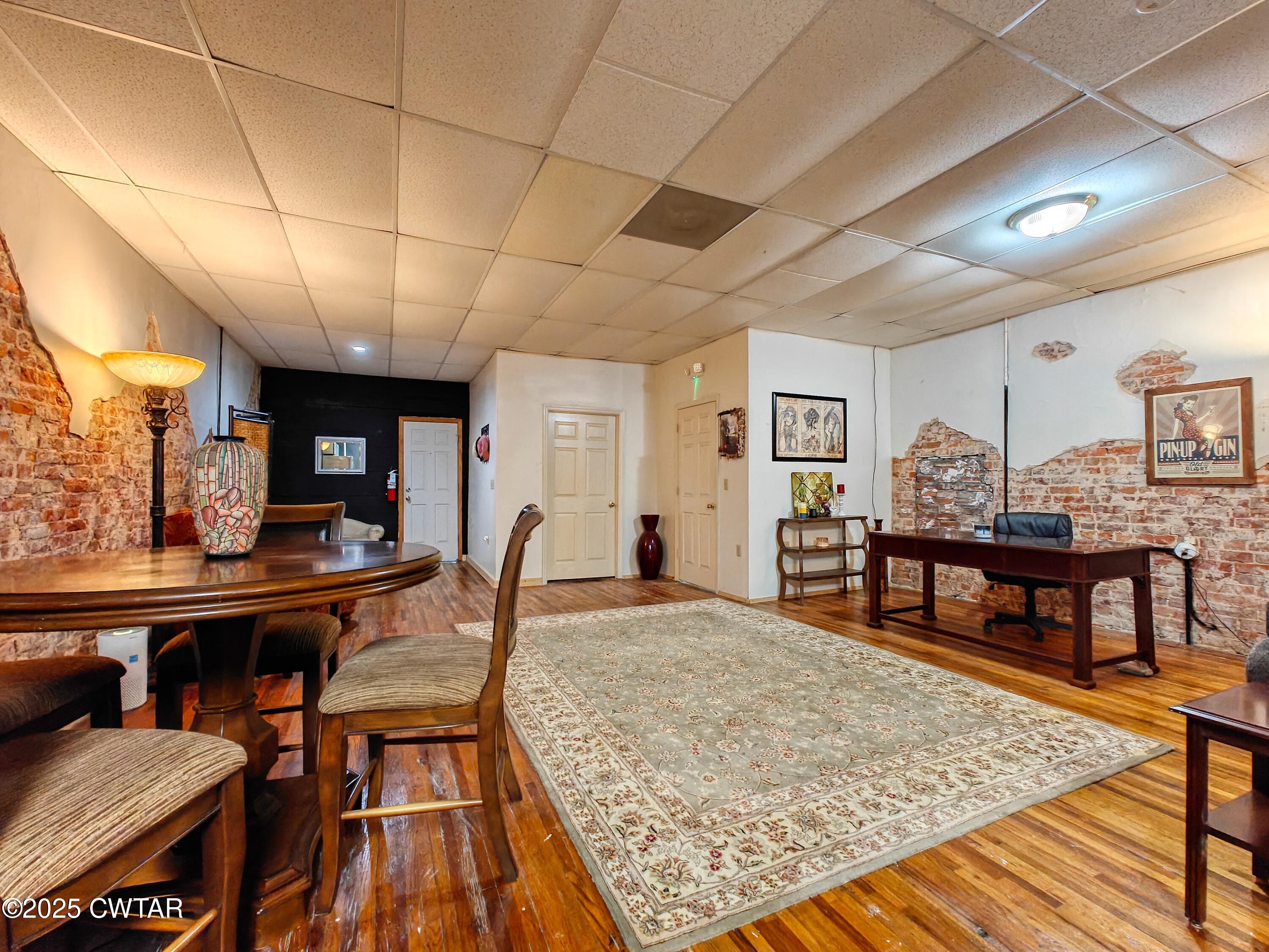 121 North Poplar Street Paris, TN 38242 - Photo 11 of 38 a view of a dining room with furniture