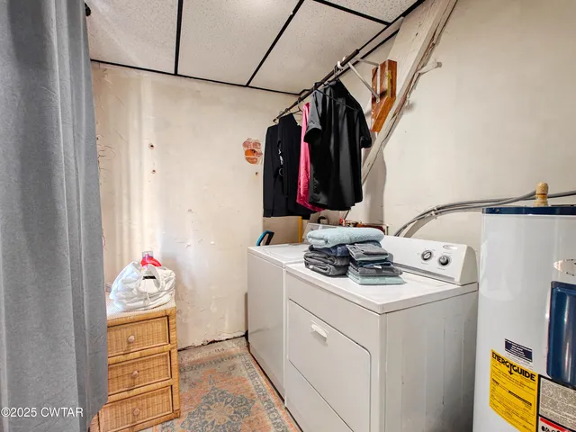 a bathroom with a double vanity sink and mirror