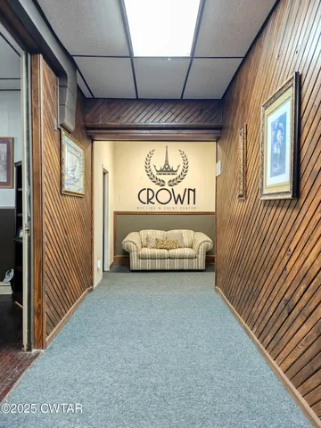 a outdoor living space with furniture and a fireplace