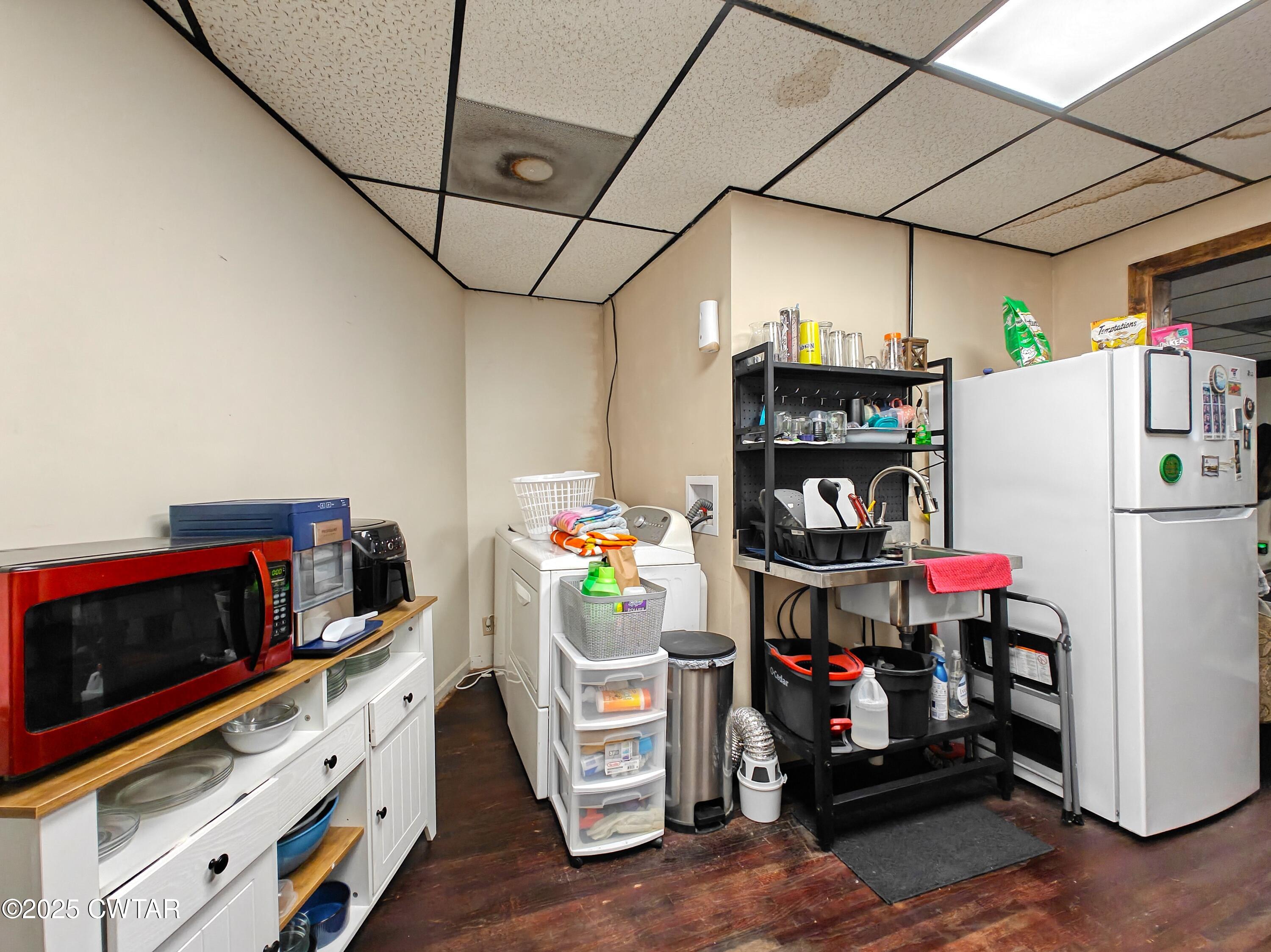 121 North Poplar Street Paris, TN 38242 - Photo 23 of 38 a room with storage and utility