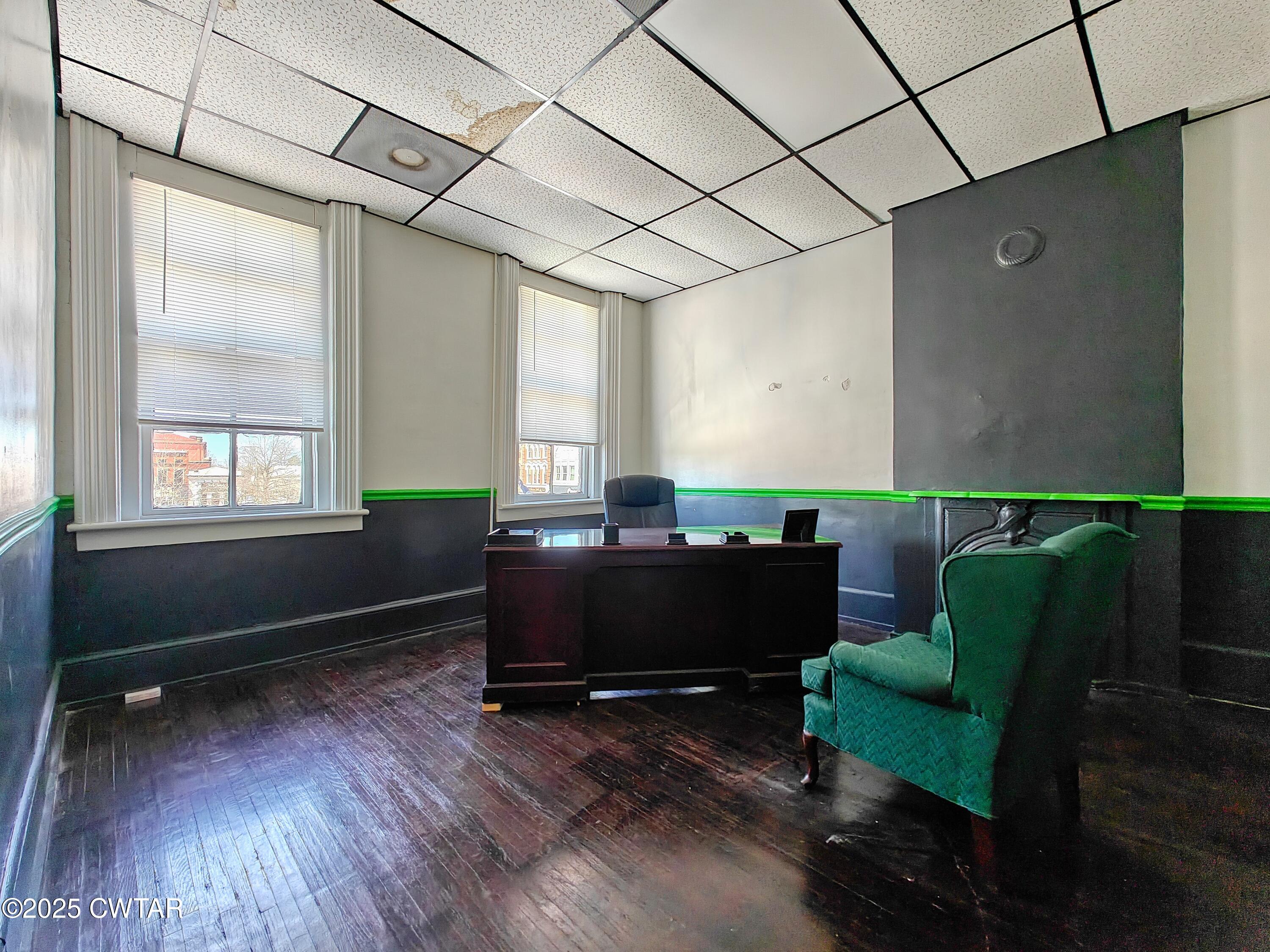 121 North Poplar Street Paris, TN 38242 - Photo 28 of 38 a living room with furniture and a window