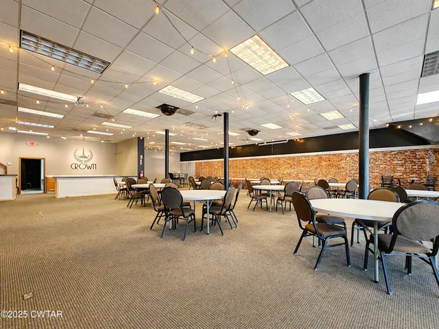 a group of people sitting in a room