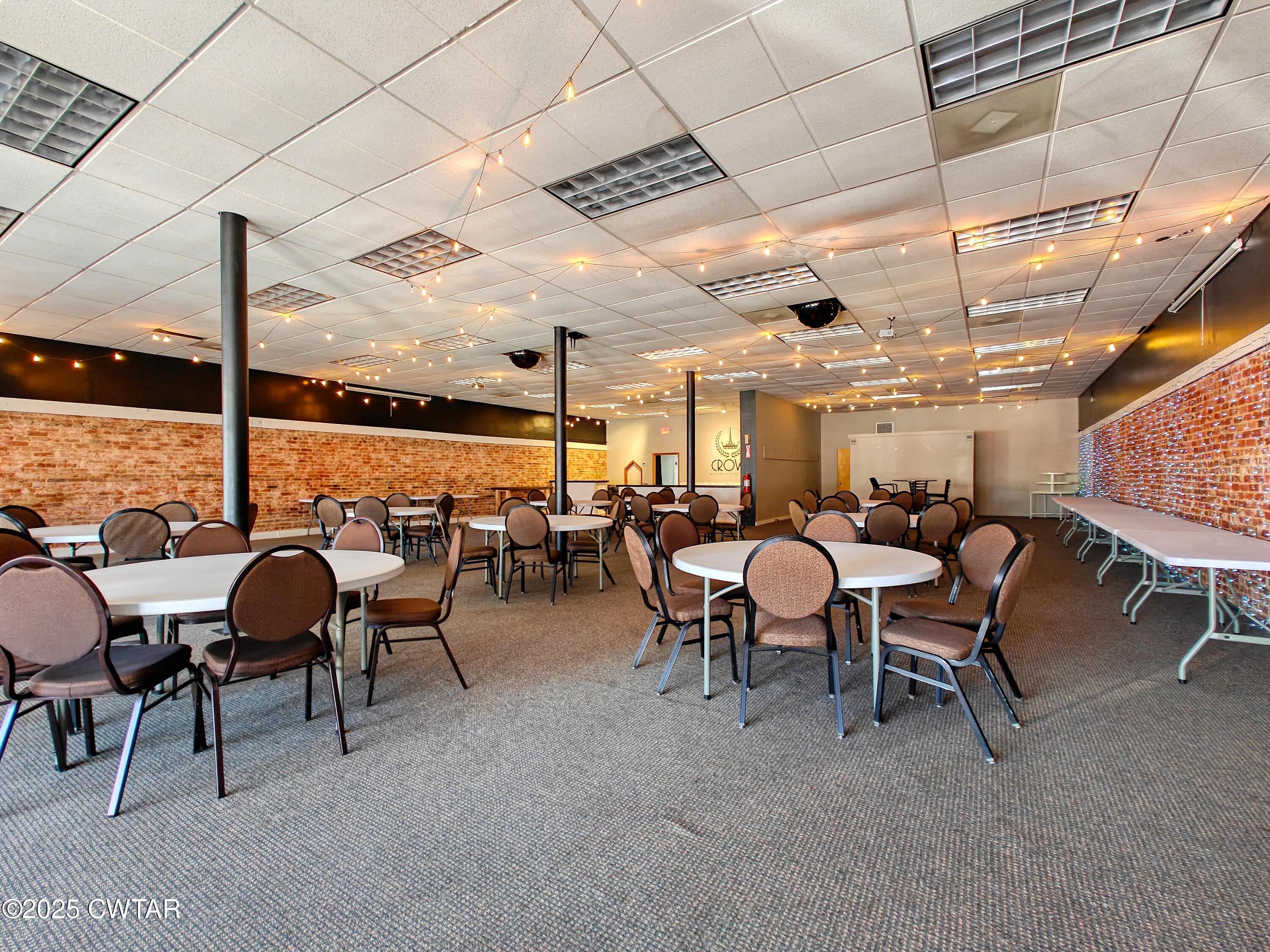 121 North Poplar Street Paris, TN 38242 - Photo 33 of 38 a view of a big room with gym equipment