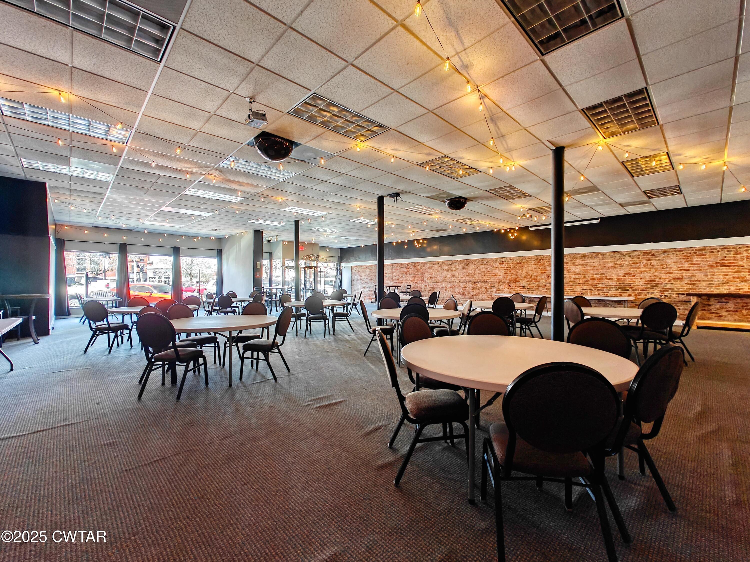 121 North Poplar Street Paris, TN 38242 - Photo 34 of 38 a view of a dining room with furniture window and outside view
