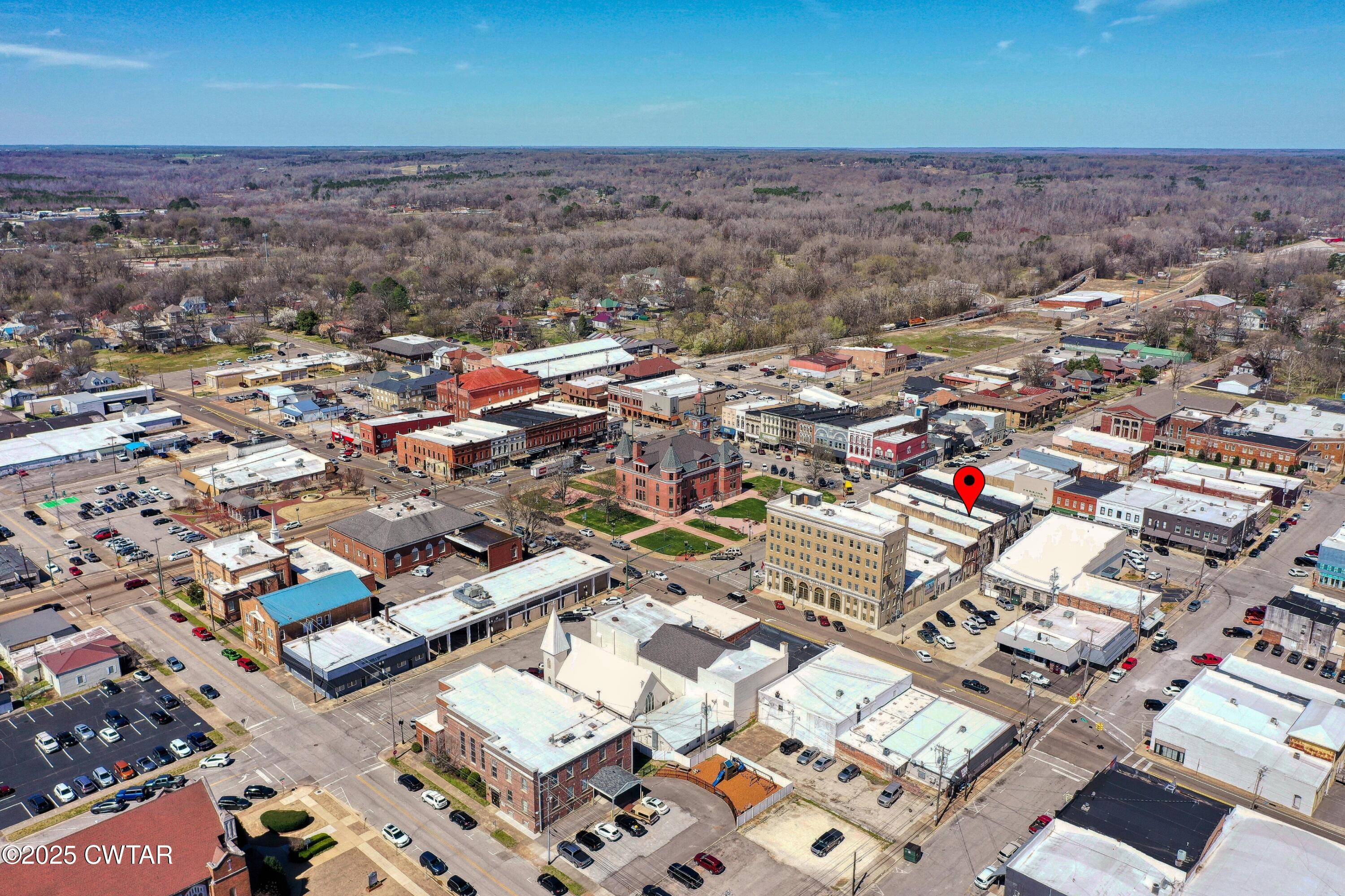 121 North Poplar Street Paris, TN 38242 - Photo 9 of 38 an aerial view of a city