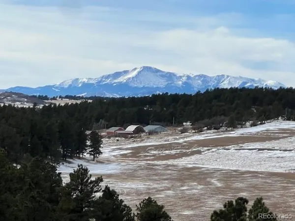 a view of lake with mountain