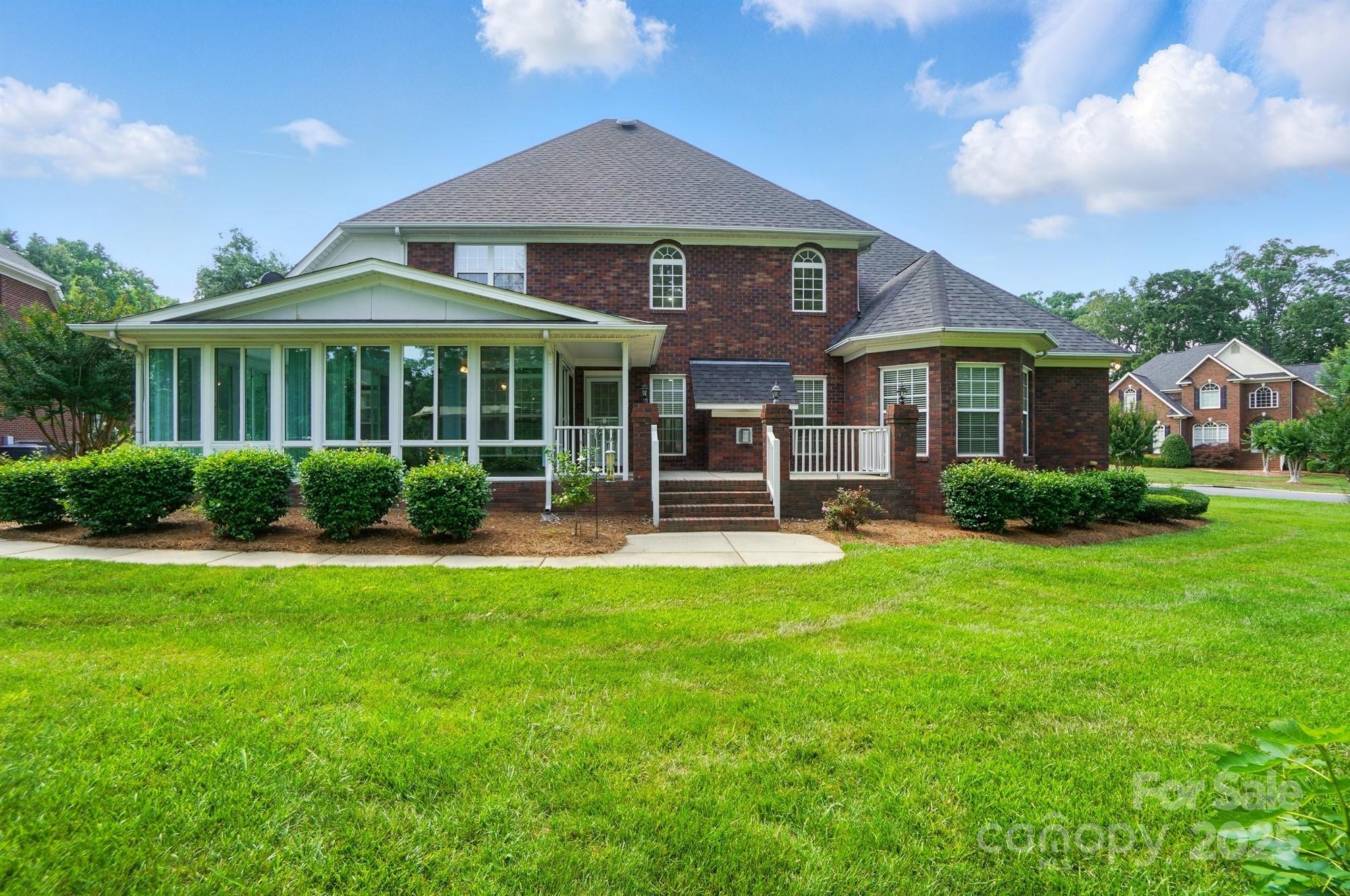 201 Limerick Drive Matthews, NC 28104 - Photo 1 of 34 a front view of a house with a yard