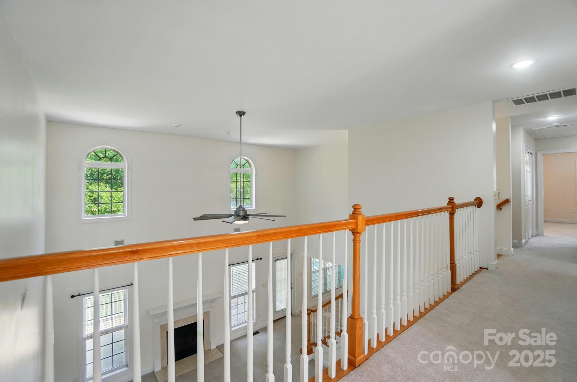 201 Limerick Drive Matthews, NC 28104 - Photo 20 of 34 a view of a hallway with a window