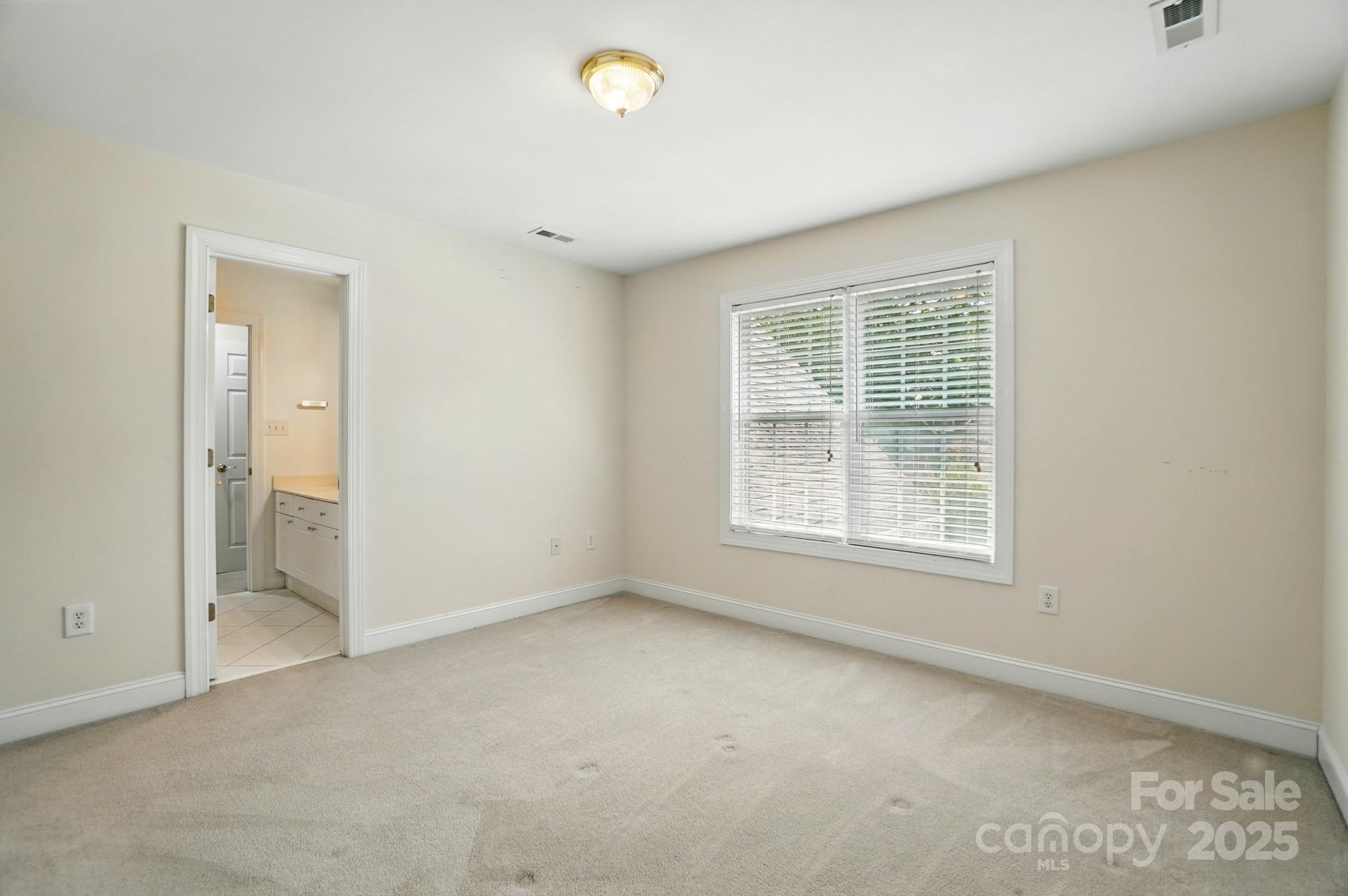 201 Limerick Drive Matthews, NC 28104 - Photo 21 of 34 an empty room with a window