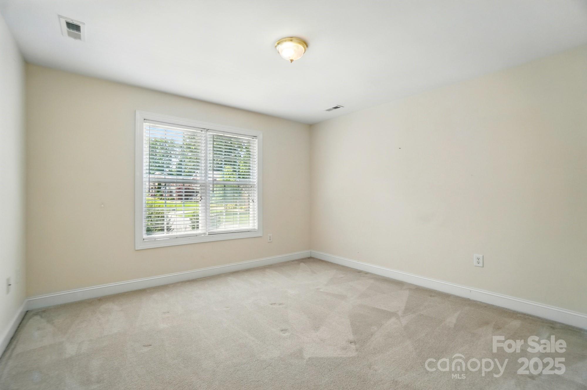 201 Limerick Drive Matthews, NC 28104 - Photo 23 of 34 an empty room with a window