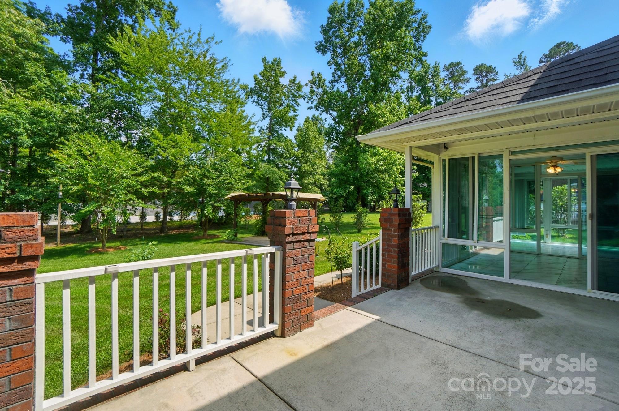 201 Limerick Drive Matthews, NC 28104 - Photo 27 of 34 a house view with a garden