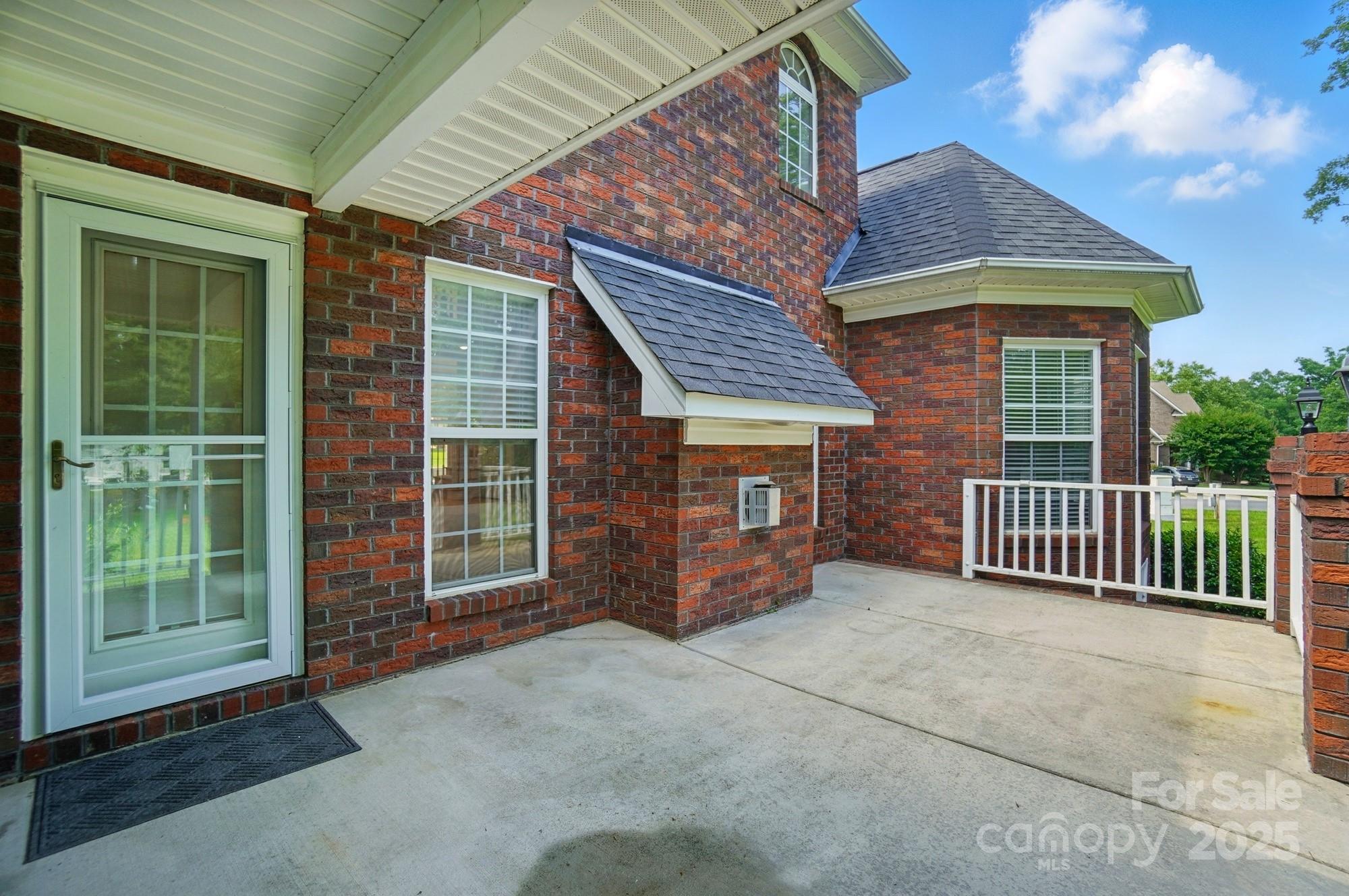 201 Limerick Drive Matthews, NC 28104 - Photo 28 of 34 a front view of a house with a porch