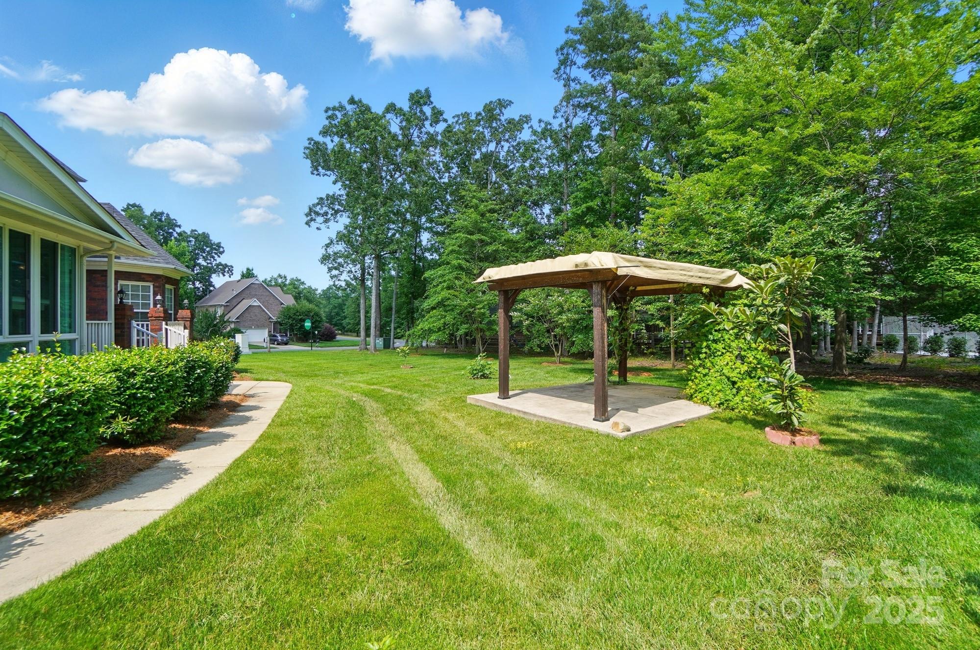 201 Limerick Drive Matthews, NC 28104 - Photo 34 of 34 a swimming pool with outdoor seating and yard