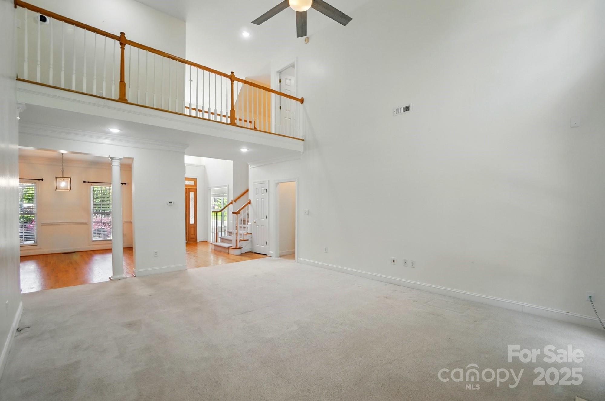 201 Limerick Drive Matthews, NC 28104 - Photo 10 of 34 a view of empty room with wooden floor