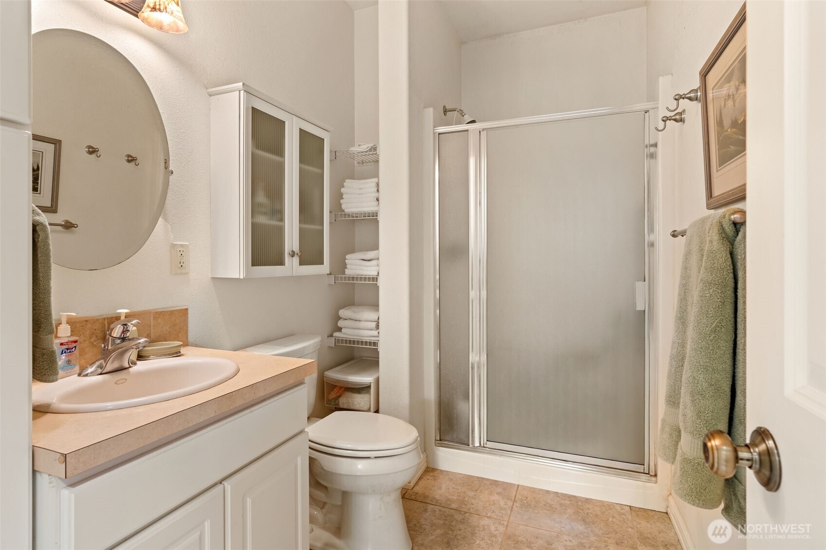 301 Russell Road Winlock, WA 98596 - Photo 15 of 40 a bathroom with a sink toilet and shower
