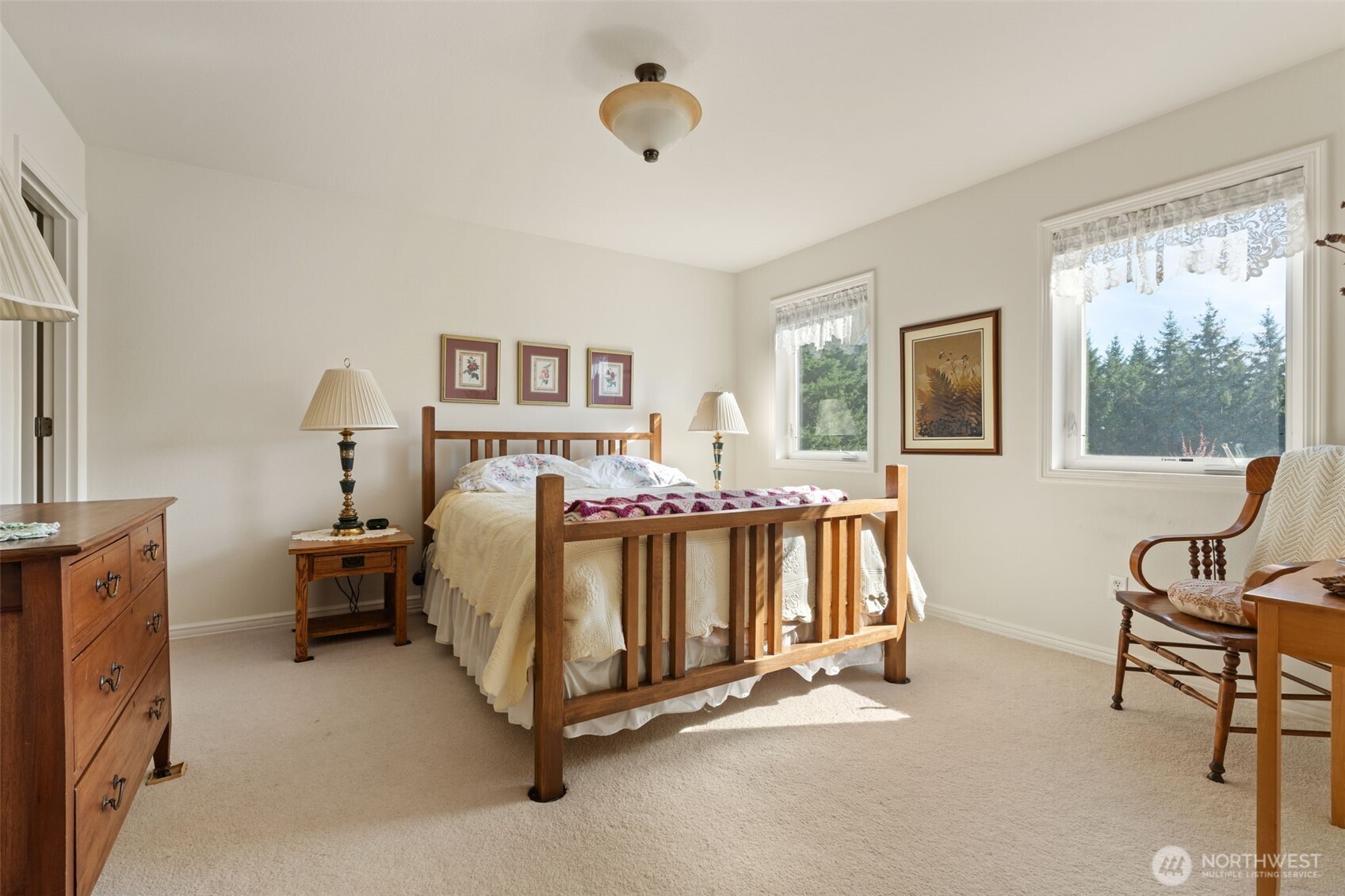 301 Russell Road Winlock, WA 98596 - Photo 16 of 40 a bed room with furniture and a window