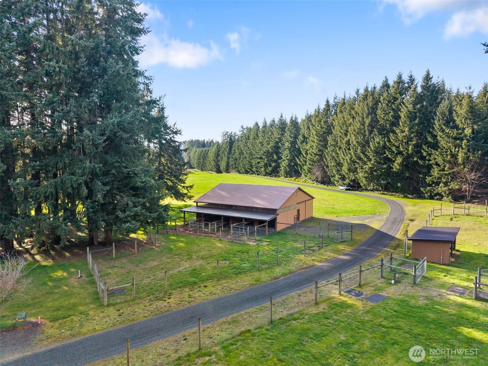 301 Russell Road Winlock, WA 98596 - Photo 33 of 40 a view of swimming pool with a garden and slide