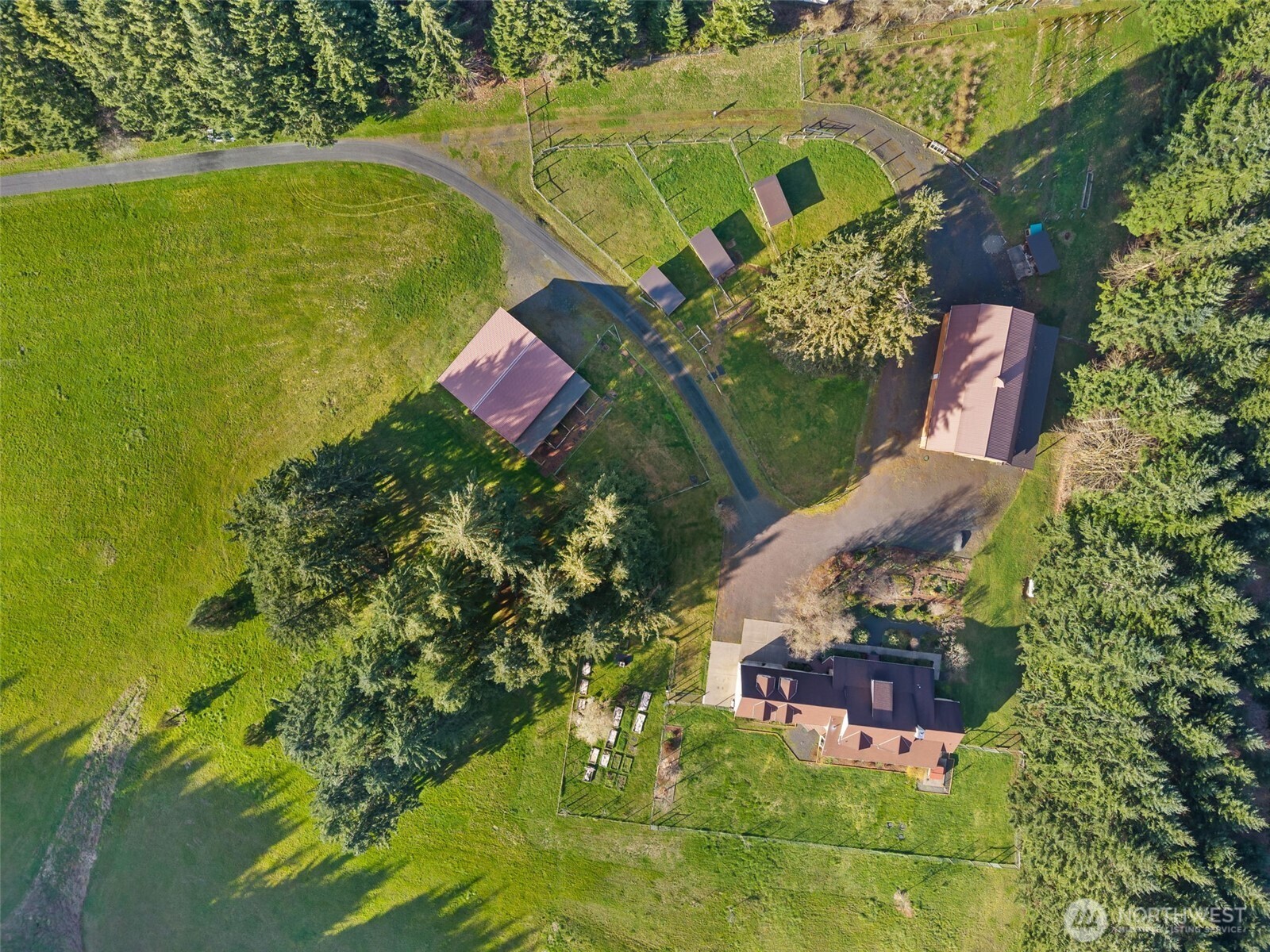 301 Russell Road Winlock, WA 98596 - Photo 39 of 40 an aerial view of a house with a yard swimming pool and outdoor seating