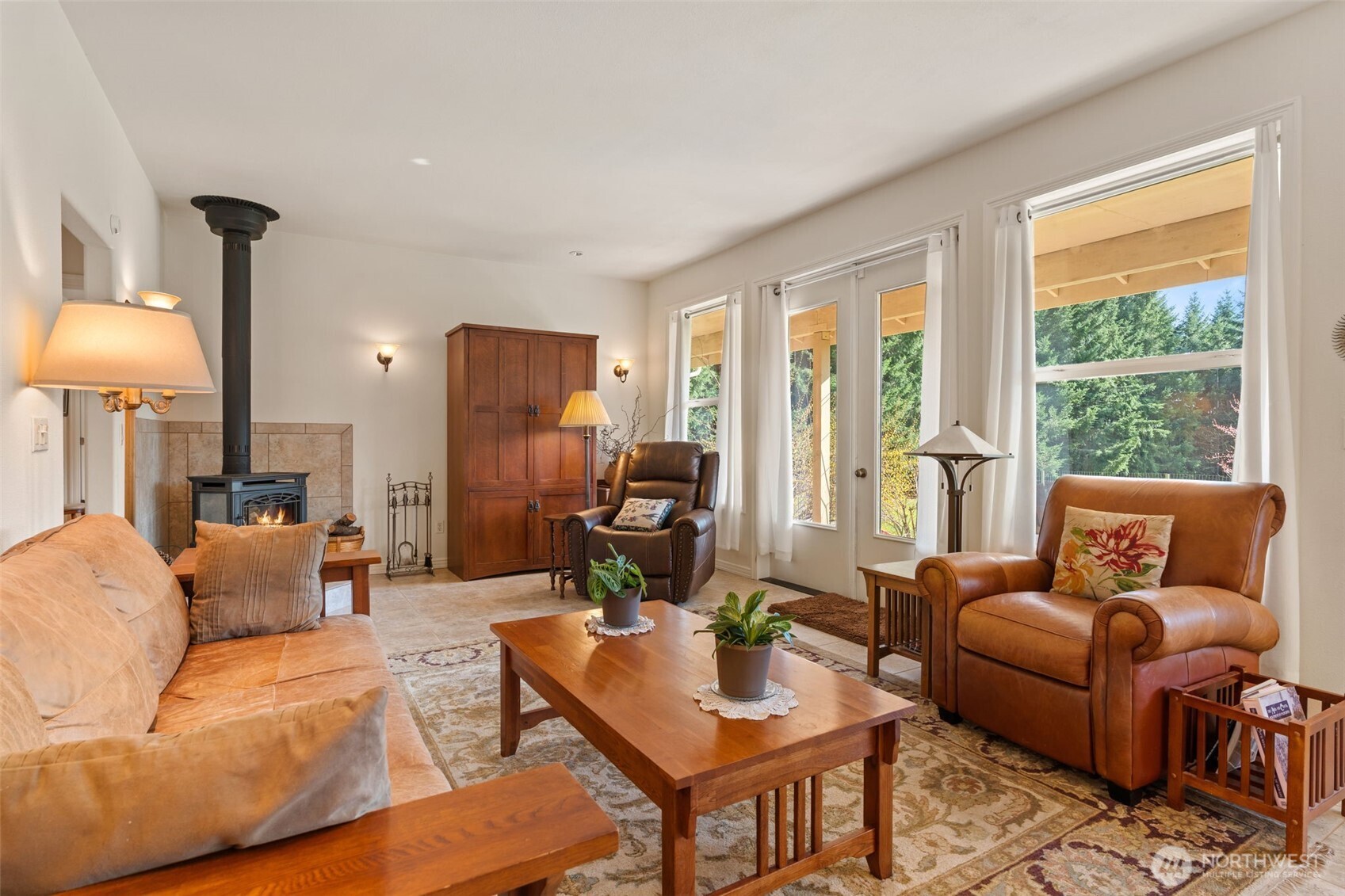301 Russell Road Winlock, WA 98596 - Photo 7 of 40 a living room with furniture a lamp and a large window
