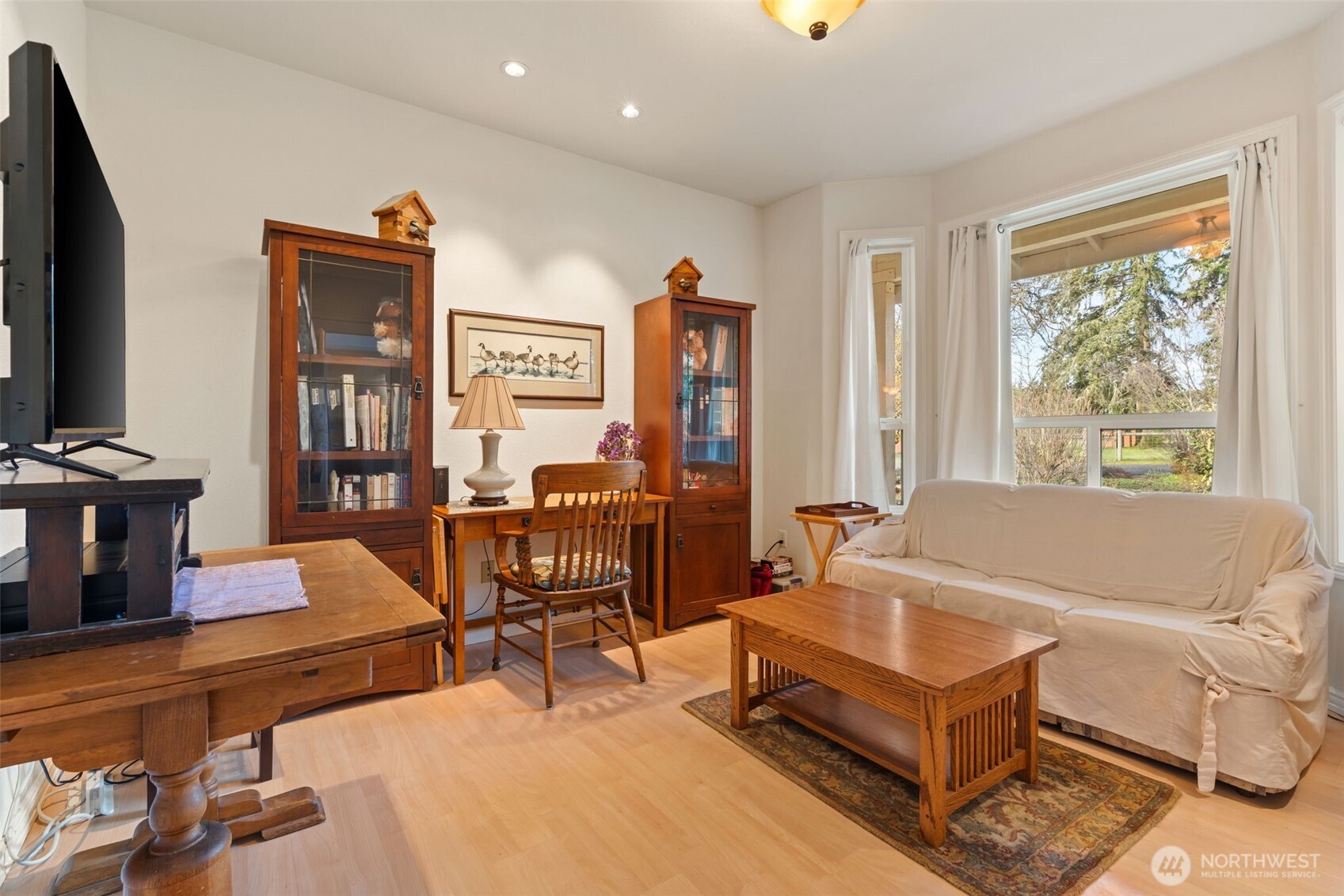 301 Russell Road Winlock, WA 98596 - Photo 9 of 40 a living room with furniture and a flat screen tv